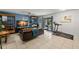 Living room featuring comfortable seating and a home gym at 1118 2Nd S Ave, Tierra Verde, FL 33715