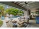 Outdoor oasis with pool, lounge area, and patio furniture at 1118 2Nd S Ave, Tierra Verde, FL 33715