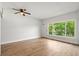 Spacious living room with hardwood floors and large windows at 4001 58Th N St # 28, St Petersburg, FL 33709