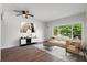 Living room features hardwood floors and a neutral color scheme at 4001 58Th N St # 28, St Petersburg, FL 33709
