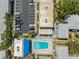 Community pool and deck viewed from above at 1190 Rue Des Chateaux # 2A, South Pasadena, FL 33707