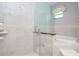 Elegant bathroom with a walk-in shower and soaking tub at 803 W Sligh Ave, Tampa, FL 33604