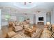 Spacious living room with hardwood floors and cozy seating area at 803 W Sligh Ave, Tampa, FL 33604