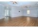 Hardwood floor living room with high ceilings and wainscoting at 803 W Sligh Ave, Tampa, FL 33604