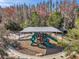 playground with shaded play structure and surrounding landscaping at 1580 Bering Rd, Wesley Chapel, FL 33543