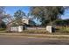 Raintree Terrace community entrance with signage and landscaping at 12917 Rain Forest St, Temple Terrace, FL 33617