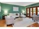 Spacious living room featuring a neutral color palette and hardwood floors at 12917 Rain Forest St, Temple Terrace, FL 33617