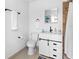 Clean bathroom with white vanity, toilet and shower at 13426 Gulf Blvd, Madeira Beach, FL 33708