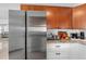 Stainless steel refrigerator in a newly remodeled kitchen at 13426 Gulf Blvd, Madeira Beach, FL 33708