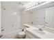 Clean bathroom with a tub, sink, and vanity at 12141 Spartan Way # 103, Hudson, FL 34667