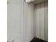 Small storage room with white paneling at 12141 Spartan Way # 103, Hudson, FL 34667