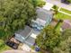 Aerial view of the home showcasing its backyard, landscaping, and surrounding neighborhood at 6619 Livingston N Ave, St Petersburg, FL 33702