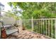 Private balcony offering an outdoor seating area and tranquil garden views at 9 Pelican Pl, Belleair, FL 33756