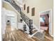 Elegant entryway with hardwood floors and a grand staircase at 12506 Ashdown Dr, Odessa, FL 33556