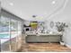 Relaxing living room with a sectional sofa, fireplace, and sliding doors to the pool at 12506 Ashdown Dr, Odessa, FL 33556