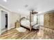 Luxurious main bedroom with a king-size bed and ornate accents at 12506 Ashdown Dr, Odessa, FL 33556