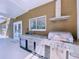 Stainless steel outdoor kitchen with built-in grill and sink at 12506 Ashdown Dr, Odessa, FL 33556