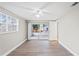 Bedroom with sliding doors to patio at 3600 Landale Dr, Holiday, FL 34691