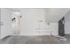 Laundry area with water heater and access to garage at 3600 Landale Dr, Holiday, FL 34691