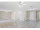 Bright living room with tile floors and ceiling fan at 3600 Landale Dr, Holiday, FL 34691