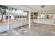 Spacious screened porch with tiled floor at 3600 Landale Dr, Holiday, FL 34691
