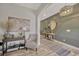 Inviting entryway features stylish decor, a decorative wall, and warm, neutral tones at 16462 Courtyard Loop, Land O Lakes, FL 34638