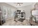 Bright office space with natural light, modern desk setup, and neutral decor at 16462 Courtyard Loop, Land O Lakes, FL 34638