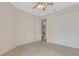 Spacious bedroom with large closet and ceiling fan at 4251 Preserve Pl, Palm Harbor, FL 34685