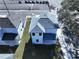 Aerial view of a modern two-story house, highlighting the gray roof at 2404 1/2 E Chelsea, Tampa, FL 33610