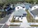 Aerial view of a house with gray roof and front yard at 2404 1/2 E Chelsea, Tampa, FL 33610