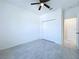 Spacious bedroom with double door closet and tile flooring at 2404 1/2 E Chelsea, Tampa, FL 33610