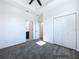 Bright bedroom with carpet and double door closet at 2404 1/2 E Chelsea, Tampa, FL 33610