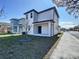 Side view of house showcasing the back patio at 2404 1/2 E Chelsea, Tampa, FL 33610