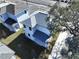 Aerial view of a new home, highlighting its gray roof and modern design at 2404 E Chelsea, Tampa, FL 33610