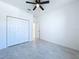 Bright bedroom with double door closet and ceiling fan at 2404 E Chelsea, Tampa, FL 33610