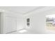 Bright bedroom features marble floors, recessed lighting, and closet at 2911 E 20Th Ave, Tampa, FL 33605