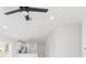 Bright living room with fresh white paint, recessed lighting, and modern ceiling fan at 2911 E 20Th Ave, Tampa, FL 33605