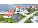 Aerial view shows building, parking, pool, and waterfront location at 6211 Sun Blvd # 601, St Petersburg, FL 33715