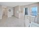 Spacious hallway with tile flooring and access to multiple rooms at 6211 Sun Blvd # 601, St Petersburg, FL 33715