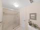 Large walk-in shower with tiled walls and built-in shelving at 6211 Sun Blvd # 601, St Petersburg, FL 33715