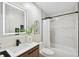 Modern bathroom with marble shower and vanity at 4607 W San Jose St, Tampa, FL 33629