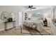 Bright bedroom with a ceiling fan and en-suite bathroom access at 4607 W San Jose St, Tampa, FL 33629