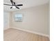 Bright bedroom with ceiling fan and new flooring at 4607 W San Jose St, Tampa, FL 33629