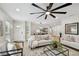 Light-filled living room with open floor plan and a modern aesthetic at 4607 W San Jose St, Tampa, FL 33629