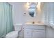 Clean bathroom with shower/tub combo and white vanity at 7141 El Matador St, Zephyrhills, FL 33541