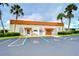 Community building with palm trees and parking at 7141 El Matador St, Zephyrhills, FL 33541