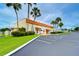 Community building with palm trees and parking at 7141 El Matador St, Zephyrhills, FL 33541