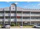 Two-story building exterior with balconies and parking at 2295 Americus E Blvd # 27, Clearwater, FL 33763