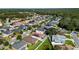 Aerial view of a residential neighborhood with a variety of homes at 3147 Calvano Dr, Land O Lakes, FL 34639