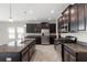 Modern kitchen with stainless steel appliances and granite countertops at 3147 Calvano Dr, Land O Lakes, FL 34639